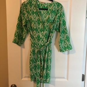 Green and white silky dress